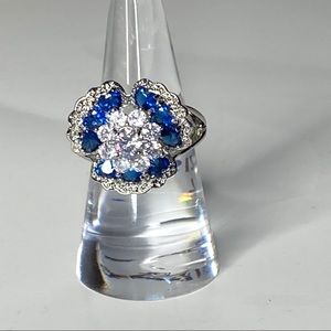 silver toned blue and silver flowered ring